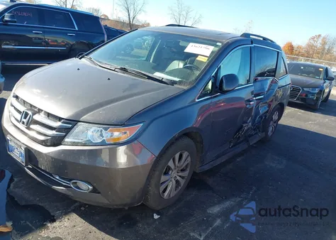 2014 Honda Odyssey Ex-L z USA, uszkodzony, nr VIN 5FNRL5H60EB031424